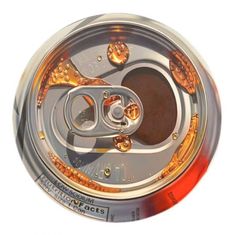 an open can of soda on a white background