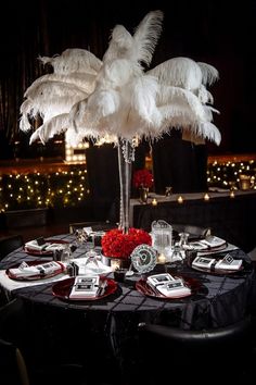 the table is set with an elegant centerpiece