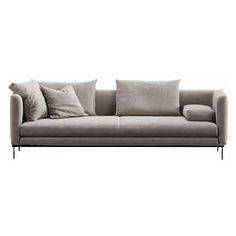 a gray couch with pillows on top of it