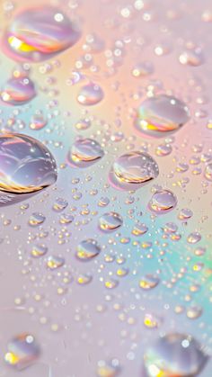 drops of water on a colorful surface