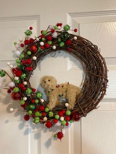 a dog is sitting in the middle of a wreath