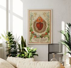 a living room filled with lots of plants next to a wall mounted art piece on the wall