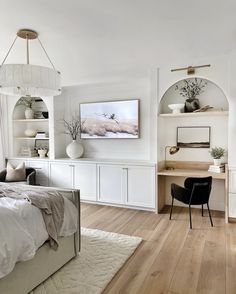 the instagram page shows an image of a bedroom with white walls and wood floors