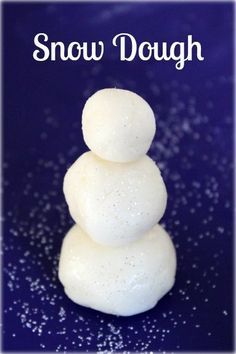 three snow dough balls stacked on top of each other with the words snow dough above them