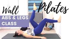 a woman is doing an abs and legs class with the words wall pilates above her