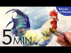 someone is painting a rooster with watercolors on the paper and it's time to paint