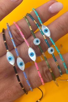 The cutest addition to any #SeliniStack. Made with pearl evil eye and Miyuki beads.Pull tie closure.Fits all. Handmade Black Evil Eye Bracelet Cheap, Duy Beni Bracelet, Evil Eye Diy Bracelet, Evil Eye Bracelet Beaded, Evil Eye Diy, Miyuki Beads, Bracelet Beaded, Eye Bracelet, Childrens Jewelry