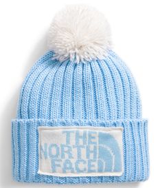 From The North Face, this hat featureA deep-fit designPomExaggerated ribCuffedKnit logo patchOne size fits mostRecycled polyesterMachine wash/tumble dryImported. Cute Snowboards, Winter Hats Outfit, Cornflower White, Skiing Gear, College Necessities, Winter Wishlist, Light Grey Leggings, North Face Hat, Ski Clothes