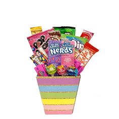 a candy box filled with lots of different types of candies and snacks in it