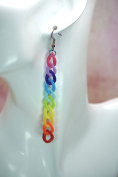 Imagine a sunny day at a vibrant pride parade, the streets filled with colors and exuberance. Our Rainbow Chain LGBTQ Pride Earrings embody that same spirit of celebration and unity. Each earring features a beautifully crafted rainbow chain, symbolizing diversity and inclusivity. When you wear these earrings, you're not just accessorizing; you're making a bold statement of support for the LGBTQ community. The vibrant colors of the rainbow reflect love, hope, and equality, making these earrings a Unlabeled Pride, Rainbow Gifts, Pride Earrings, Pride Jewelry, Shoulder Duster Earrings, Pride Jewellery, Rainbow Gift, Month Gifts, Pride Parade