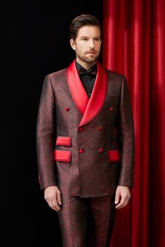 Stand out in this bold double breasted tuxedo for men or women with strong red accents that are great for any black tie event. This is great for big events, weddings, and any other formal event where you would like to add an additional pop of color to a formal evening. FREE SHIPPING ON ORDERS OVER $199 COLOR Red COMPOSITION N/A YARN COUNT N/A WEIGHT 290g FABRIC STYLE Jacquard OCCASION Wedding/Gala Luxury Double-breasted Tuxedo For Formal Events, Luxury Double-breasted Tuxedo For Formal Occasions, Luxury Double-breasted Tuxedo For Semi-formal Occasions, Luxury Fitted Double Breasted Suit For Party, Luxury Double-breasted Tuxedo, Elegant Tailored Red Tuxedo, Red Blazer With Suit Collar For Evening, Red Wedding Suit With Suit Collar, Double-breasted Tuxedo Suits