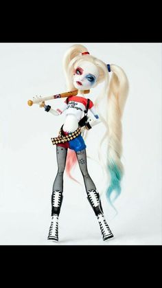 a doll with long blonde hair and blue eyes holding a baseball bat in her hand