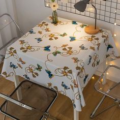 the table is covered with a butterfly print