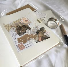 an open notebook with some pictures on it