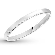 a white gold wedding ring on a white background