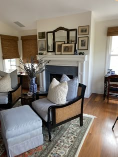 a living room filled with furniture and a fire place