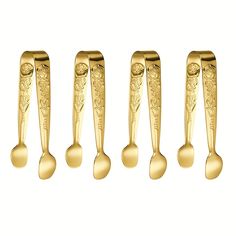 four gold spoons and two forks are lined up