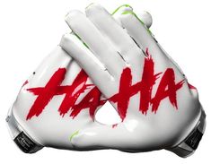 a white and red baseball glove with the word aha painted on it's palm