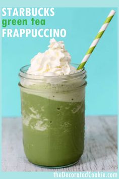 starbucks green tea frappuccino in a mason jar with whipped cream on top