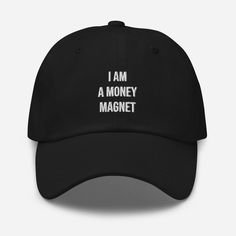 Unlock the potential for financial abundance with the Money Magnet Affirmation Dad Hat. This stylish hat combines fashion with positive affirmations to help you attract prosperity and success.🤑 Made with premium materials, this dad hat offers a comfortable and adjustable fit, making it suitable for any head size. The embroidered "Money Magnet" design serves as a daily reminder to focus your mindset on wealth and embrace the power of abundance.💎 Wear this hat confidently, whether you're heading Attracting Abundance, Magnet Design, Financial Abundance, Money Magnet, Money Talks, Small Talk, Hat Baseball, Networking Event, Stylish Hats