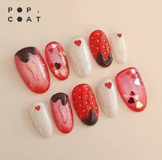 six red, white and black nail designs with hearts on them are arranged in a row