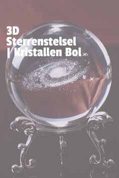 an image of a crystal ball with the words 3d sterensteelsel i kristallen bol