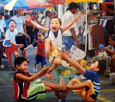 a group of children playing on the ground in front of an umbrella covered market area