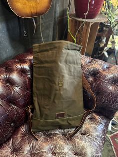 Simple design. Holds a lot of stuff. Heavy duty waxed canvas and leather dimensions approx 14”w X 18”h X 17”d imported Waxed Canvas Backpack With Leather Handles For Outdoor, Rugged Canvas Backpack For Everyday, Rugged Waxed Canvas Backpack For Everyday Use, Canvas Backpack With Tote Shape, Everyday Waxed Canvas Backpack With Leather Patch, Functional Waxed Canvas Leather Backpack For Daily Use, Waxed Canvas Backpack With Leather Handles For Everyday Use, Functional Leather Backpack With Waxed Canvas For Daily Use, Daily Use Leather Backpack With Waxed Canvas Lining