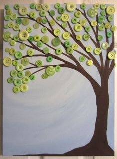 a tree made out of buttons on a canvas