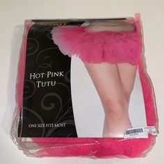 a pink tutu is packaged in a package