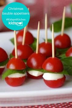 christmas bauble appetizers with toothpicks on them