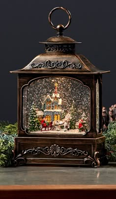 an old fashioned christmas lantern on a table