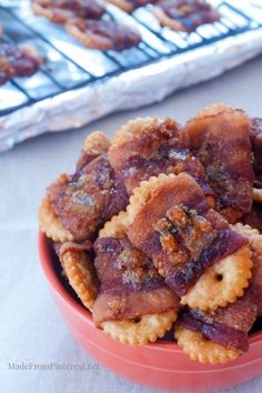 a bowl filled with fried food sitting on top of a table