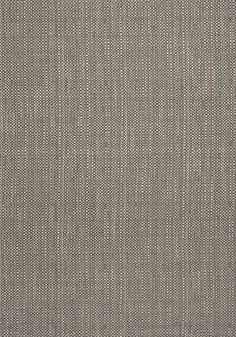 an upholstered gray fabric textured with small white dots on the top and bottom