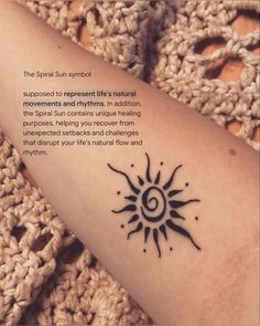 a woman's arm with a quote about the sun and her meaning on it