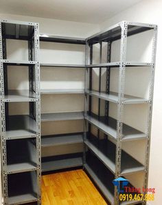 empty shelving unit with wood flooring and hard wood floors in an office building