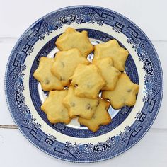 some cookies are on a blue and white plate