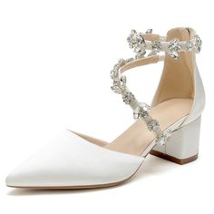 white high heeled shoes with crystal embellishments on the toe and ankle