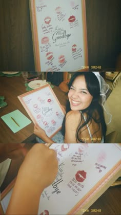 a woman is holding up a sign with lipstick on it and smiling at the camera