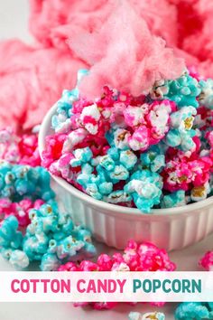 cotton candy popcorn in a bowl with pink and blue sprinkles