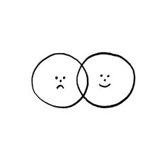 two circles with faces drawn on them