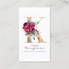 a floral monogrammed letter k on a white card