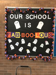 a sign that says our school is fab - boo - lous