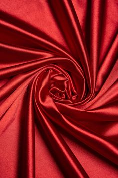 Discover the elegance of our Red Shiny Nylon Fabric, a luxurious material that exudes sophistication. Featuring a smooth, glossy finish that captures light beautifully, this satin effect fabric is perfect for crafting stunning evening dresses, chic bridal attire, and eye-catching formal garments. The bold red hue adds a dramatic flair, ensuring your creations make a statement at any special occasion or event. This fabric features a lustrous satin finish that adds an elegant touch to any garment! Bridal Attire, Nylon Fabric, Formal Attire, Dress Clothes For Women, Spandex Fabric, Satin Finish, Fabric By The Yard, Stretchy Fabric, True Colors