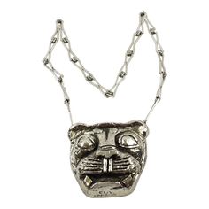 This is part of Chairish’s Costume Jewelry assortment.  Impressive Guy Laroche Paris signed pendant necklace. Extra-long chromed metal textured chain with massive dimensional pendant. The medallion features a lion face in chrome metal-coated resin. There is an engraved signature on the pendant's edge.  There is no closing clasp.  Measurements: Necklace total length is 27.13 in (69 cm) - Drop is 16.57 in long (42 cm) - medallion is 3.63 in high (9.2 cm) x 3.38 in wide (8.6 cm).  Please see the me Metal Pendant Necklace, Art Nouveau Pendant, Metal Choker, Lion Pendant, Guy Laroche, Contemporary Pendant, Medallion Necklace, Yellow Gold Pendants, Modern Pendant