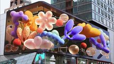 a building with balloons and flowers on it