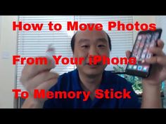 a man holding up his cell phone in front of him with the text how to move photos from your iphone to memory stick