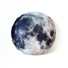 a blue and white moon sitting on top of a table