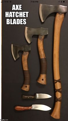 several different types of knives and axes on display