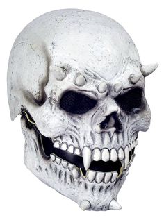 a white skull mask with horns and fangs on it's face is shown in front of a white background